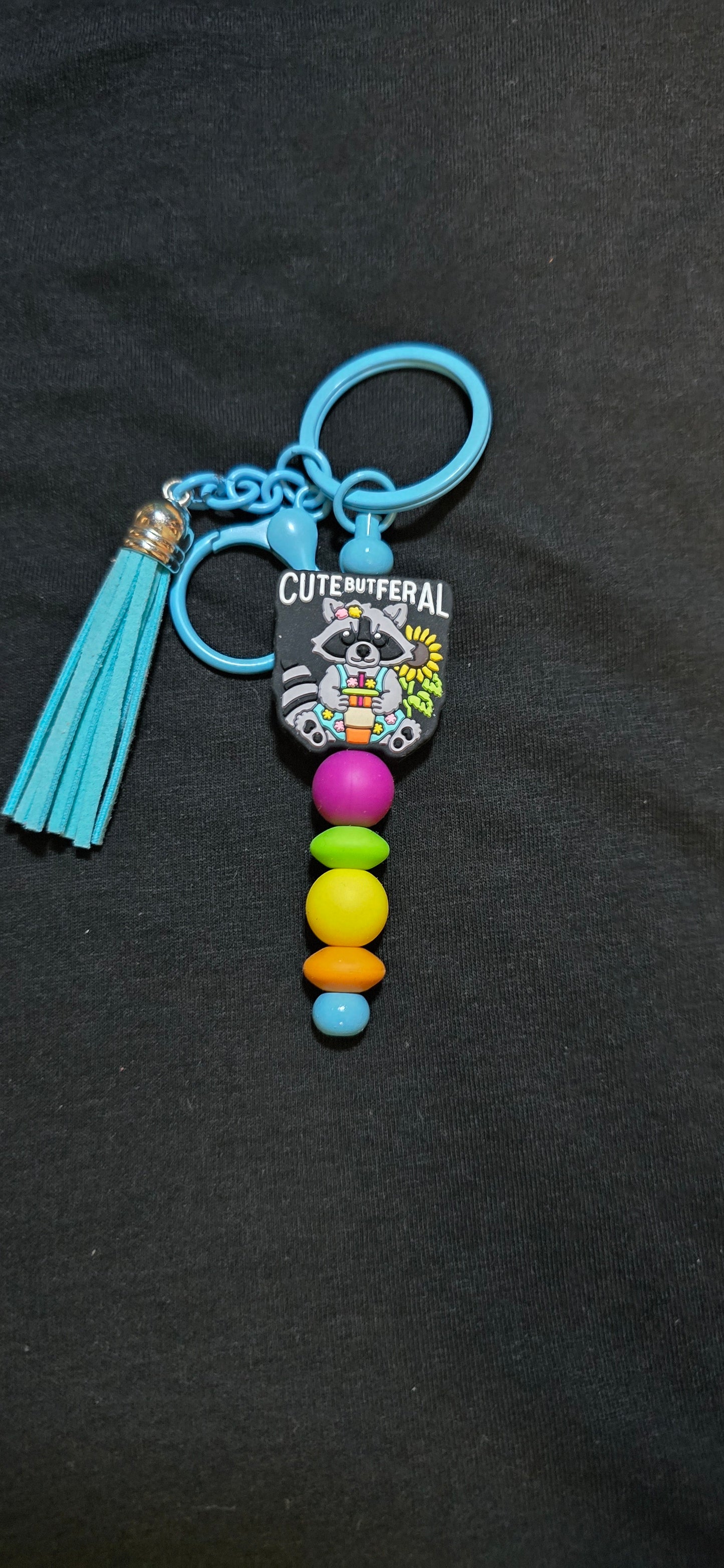 Multi colored raccoon keychain