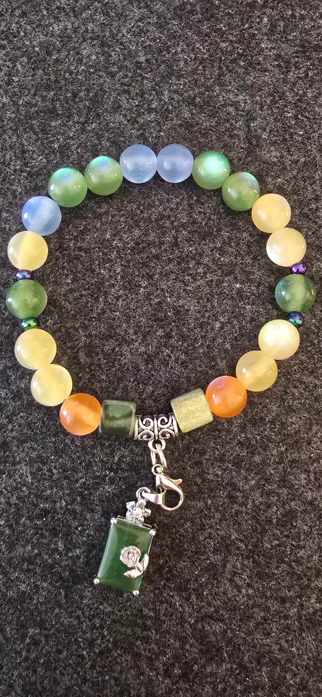 Emerald green charm w/UV beads