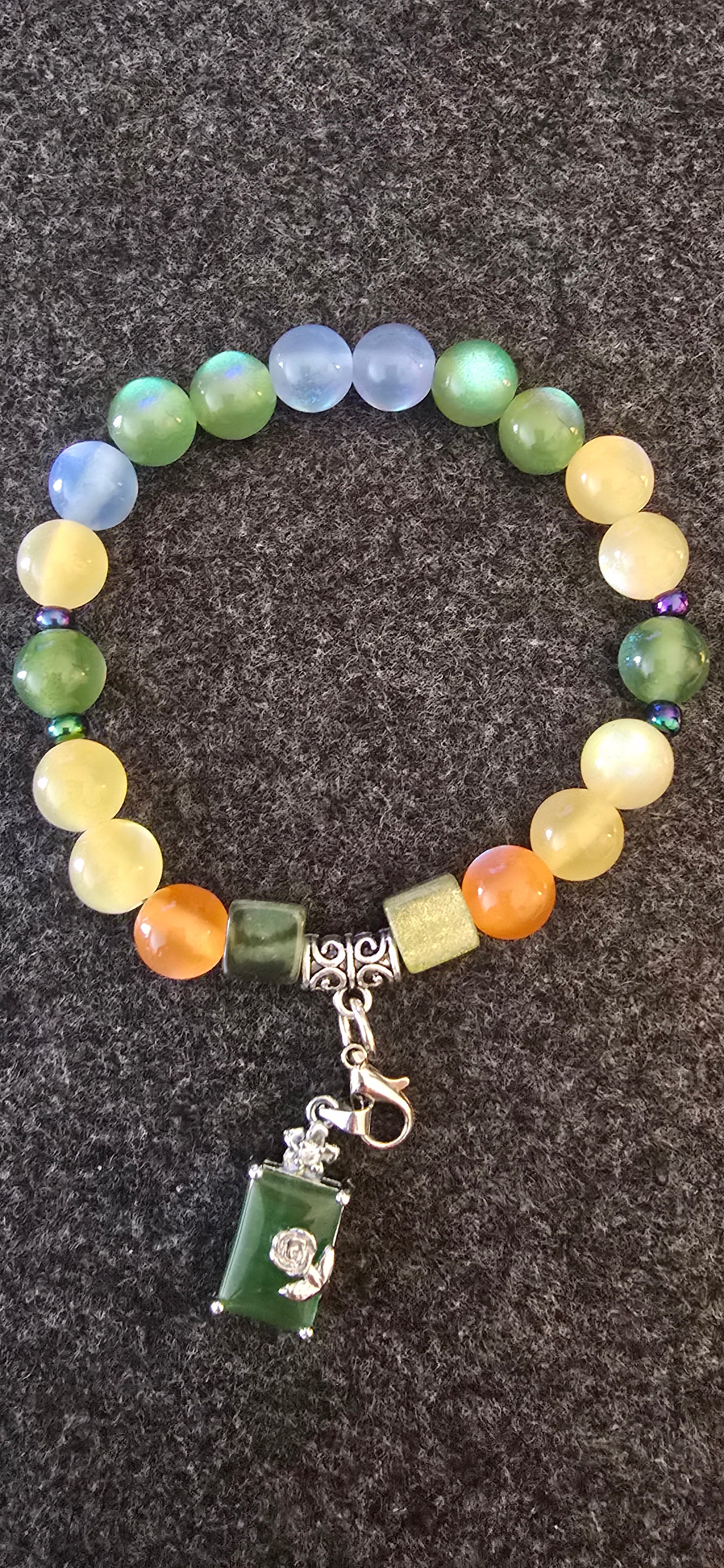 Emerald green charm w/UV beads