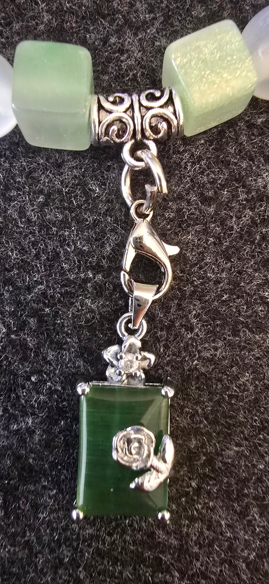 Emerald green charm w/UV beads