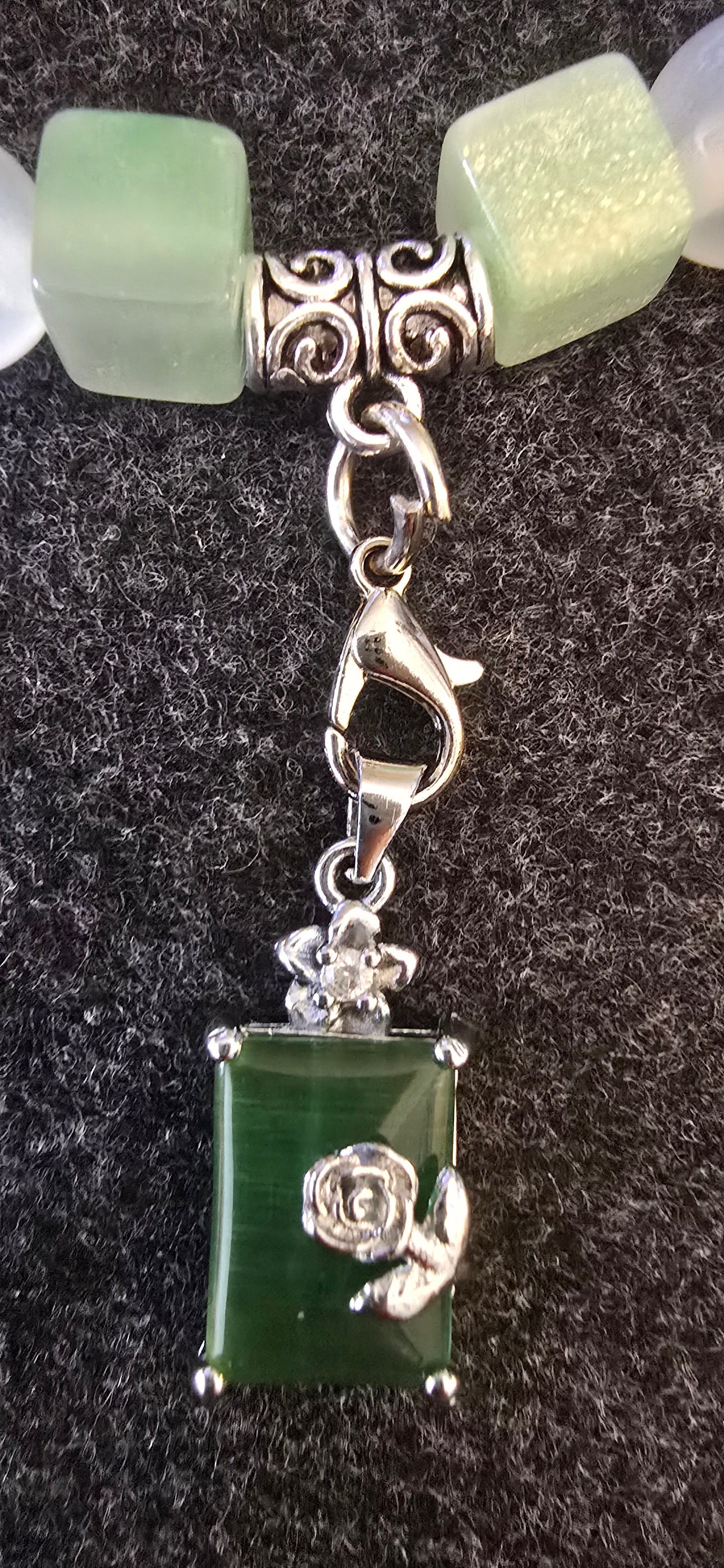 Emerald green charm w/UV beads